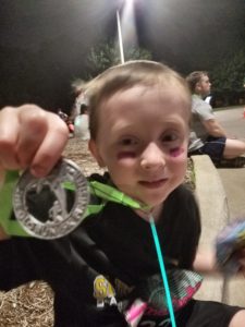 Aidan and his medal